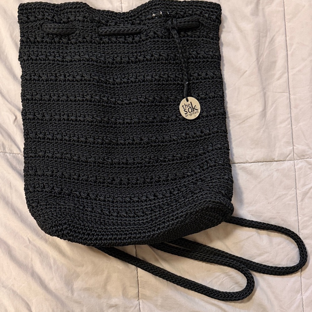 The Sak Black Crochet Drawstring Backpack Purse